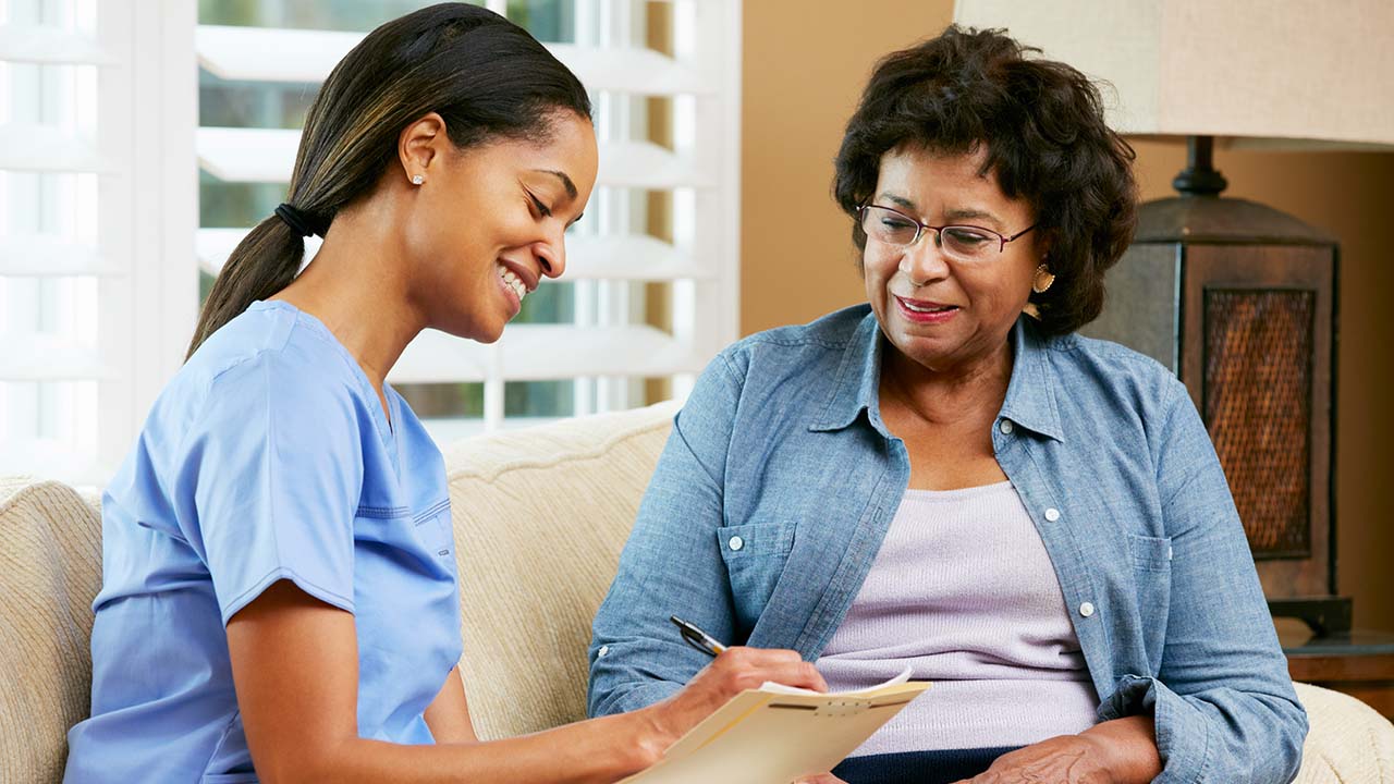 patient talking with a physician assistant about the weight loss program